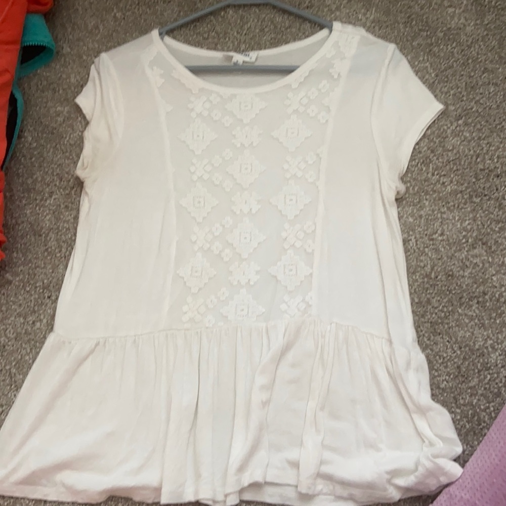 Off white loose fitting blouse with lacey detail